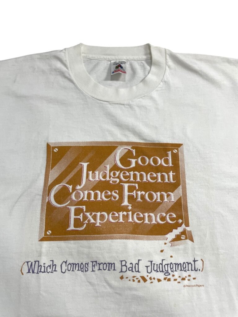 90s Peacock Papers Good Judgement Comes From Experience T-Shirt